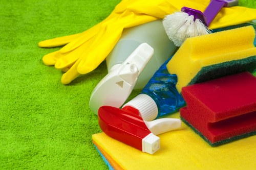 Cleaning a shared office kitchen and workspace in Merton