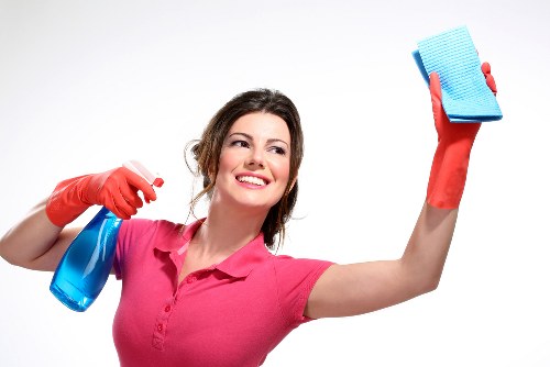 Detailed post-construction cleaning of kitchen surfaces and fixtures after renovation in Merton
